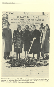 A black-and-white photo of six individuals standing in front of a large sign that reads "Library Building, Montgomery Junior College." One person holds a shovel in freshly turned dirt, indicating a groundbreaking ceremony. Snow covers the ground. All individuals are dressed in formal winter clothing and are smiling for the photo.